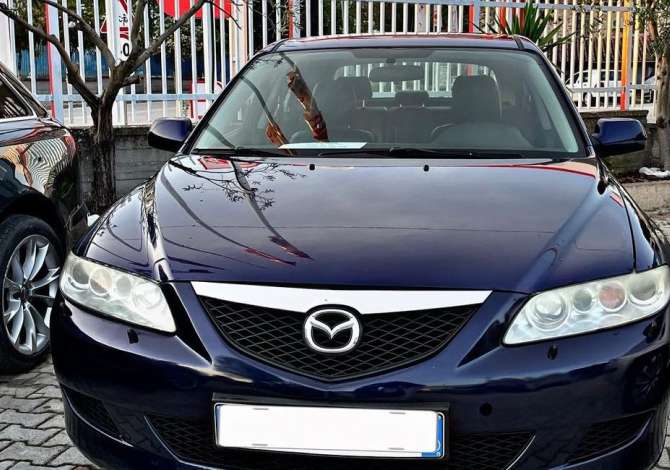 Car Rental Mazda 2004 supplied with Diesel Car Rental in Fier near the "Central" area .This Automatik Mazda Car 