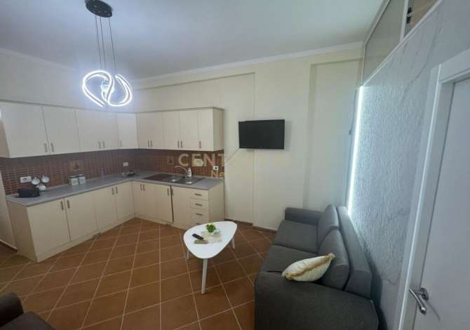 Shitet apartament 1+1 TE RROTA E KUQE 65000 EURO Organizohet ne nje salle ndenje se bashku me kuzhine, nje dhome gjumi, nje tuale