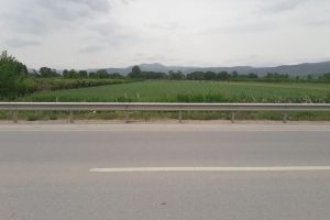 Sells 10,000 m of land on the Korce   Pogradec 1st km axis near Hotel Blue Eye Sells 10,000 m of land on the Korce   Pogradec km. First axis. The main road is 